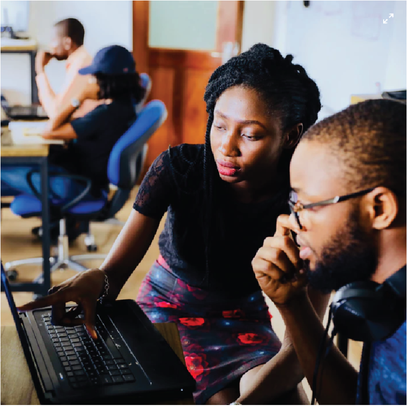 Man and Woman looking at computer screen