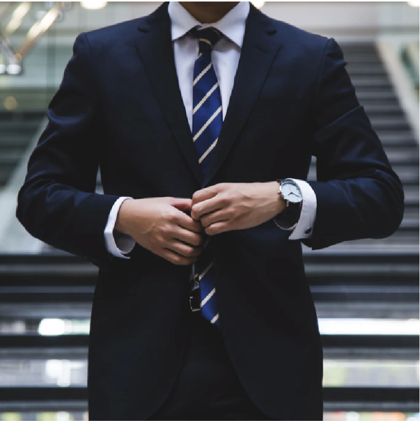 man adjusting suit