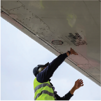 Man working on aircraft